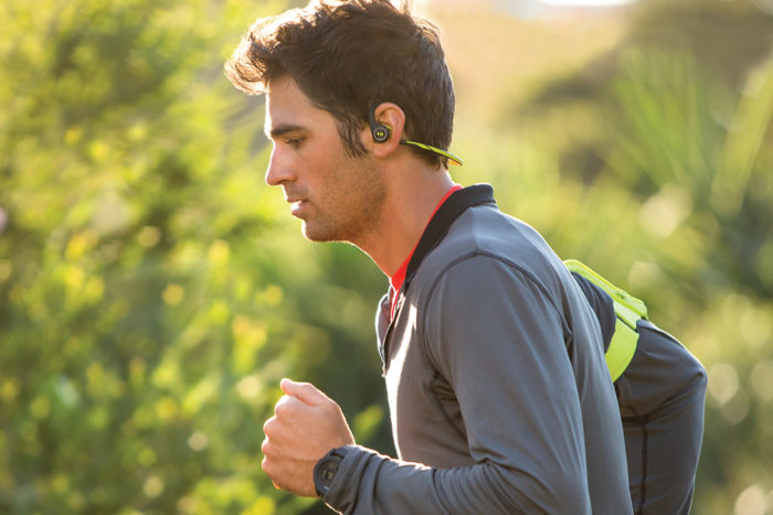 Young Man Running With Headphones